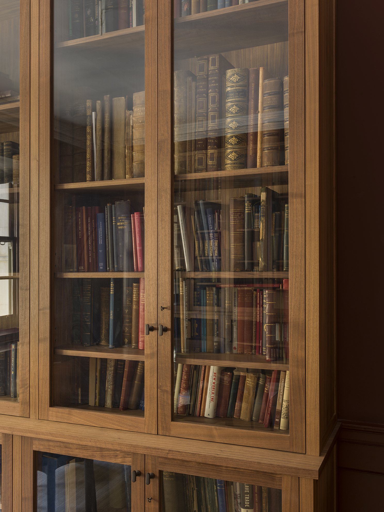 Walnut and glass cabinet detail 
